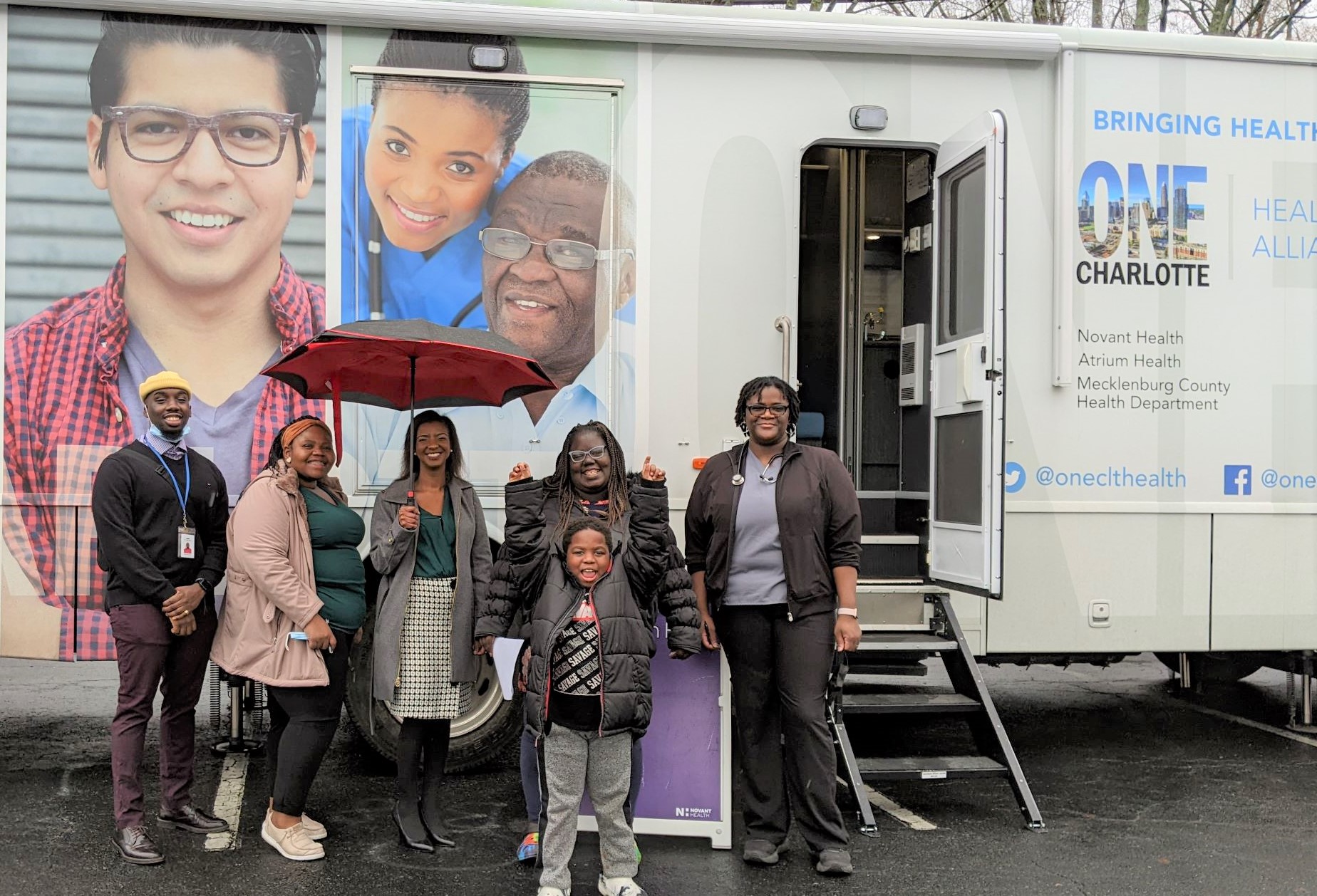 Care Ring staff with ONE Charlotte Health Alliance mobile unit